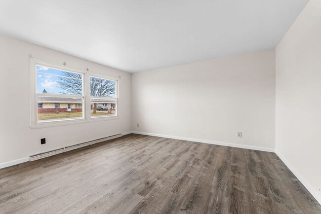 Building Photo - Delightful home with Garage and Large Yard. PETS WELCOME