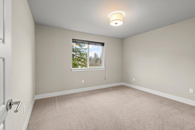 Building Photo - Backyard Putting Green + Outdoor Fireplace | Comfortable Puyallup Rental