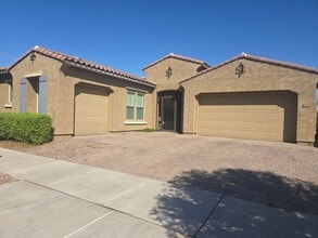 Building Photo - Five-bedroom CASITA home with a three-car ...