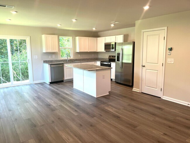 Building Photo - New Three-Bedroom, Two and one-half Bath T...