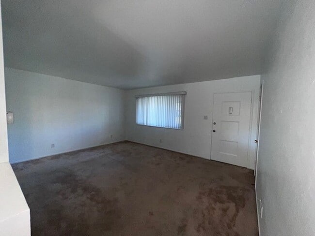 Building Photo - Freshly painted home with large backyard. ...