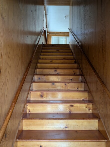Stairs to upper apartment - 460 N Main St