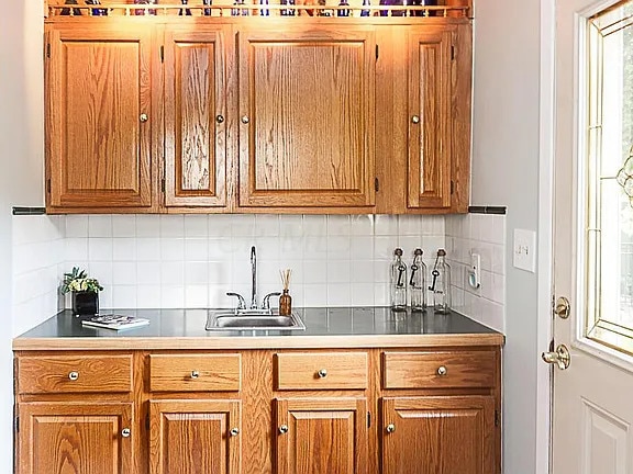 Kitchen bar area by back door - 224 Colonial Ave