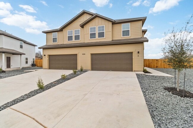 Building Photo - Brand New 4BR Home | Primary Suite Downstairs & Private Yard