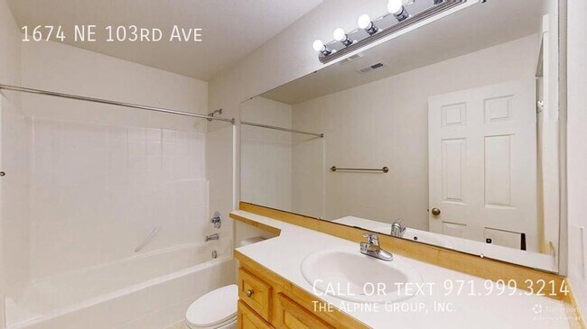 Building Photo - 1674 NE 103rd Ave