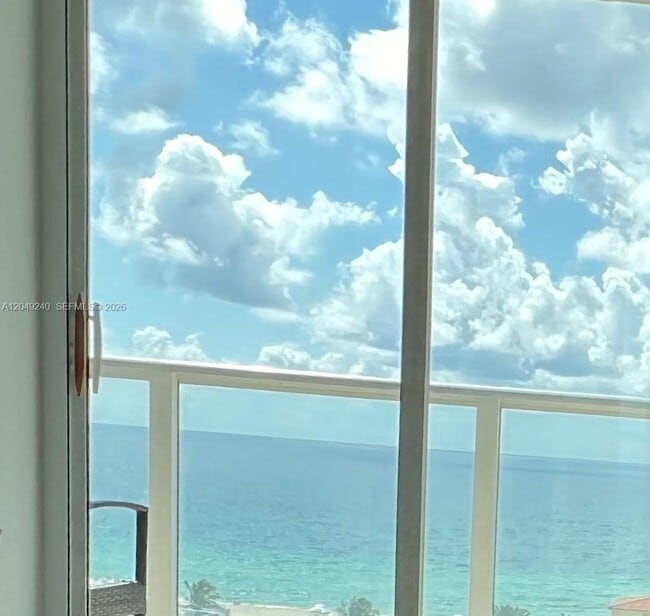 Building Photo - 5900 Collins Ave