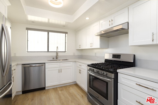 Building Photo - 1738 S Bentley Ave
