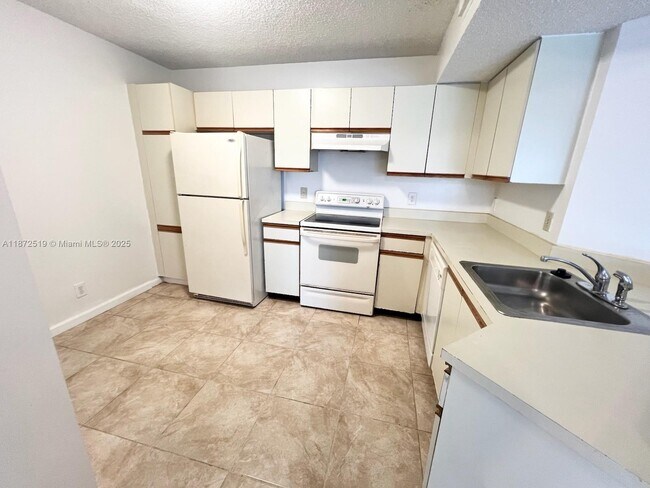 Building Photo - 8977 Wiles Rd