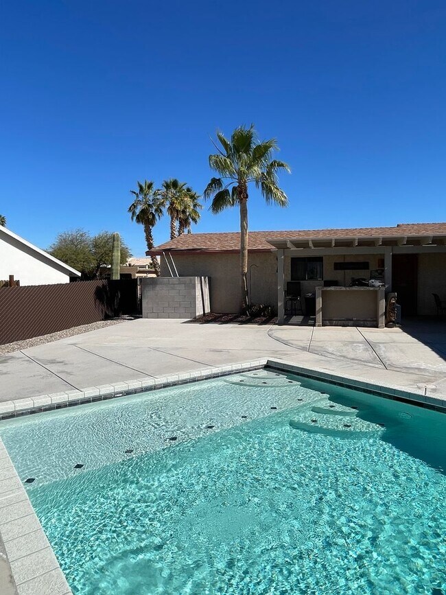 Building Photo - OWNER'S SUMMER SPECIAL-$300 OFF first 3 months! Sparkling Pool Home!
