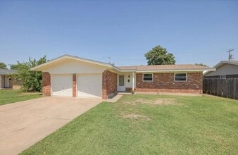 Building Photo - Brand new appliances, flooring, paint, and...