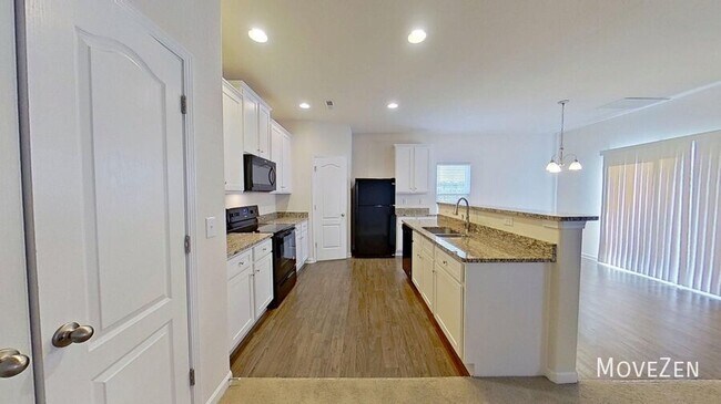 Building Photo - 7516 Mockernut Dr