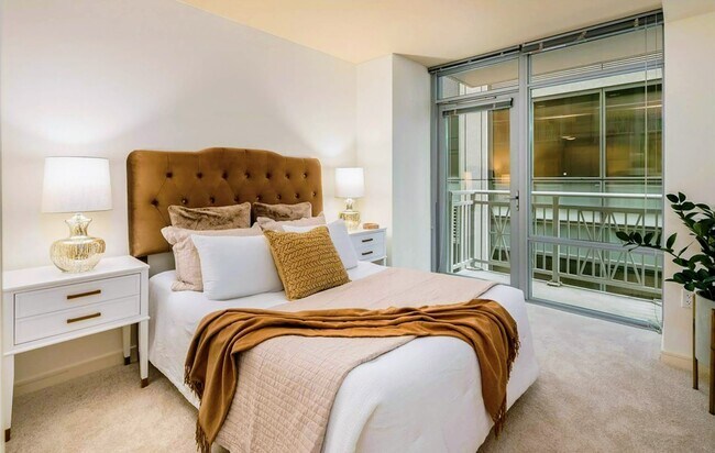 Spacious bedroom with a huge walk in closet and a balcony. - 819 Virginia St