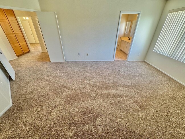 Building Photo - WELCOME TO THIS SPACIOUS 4-BEDROOM, 2.5-BA...