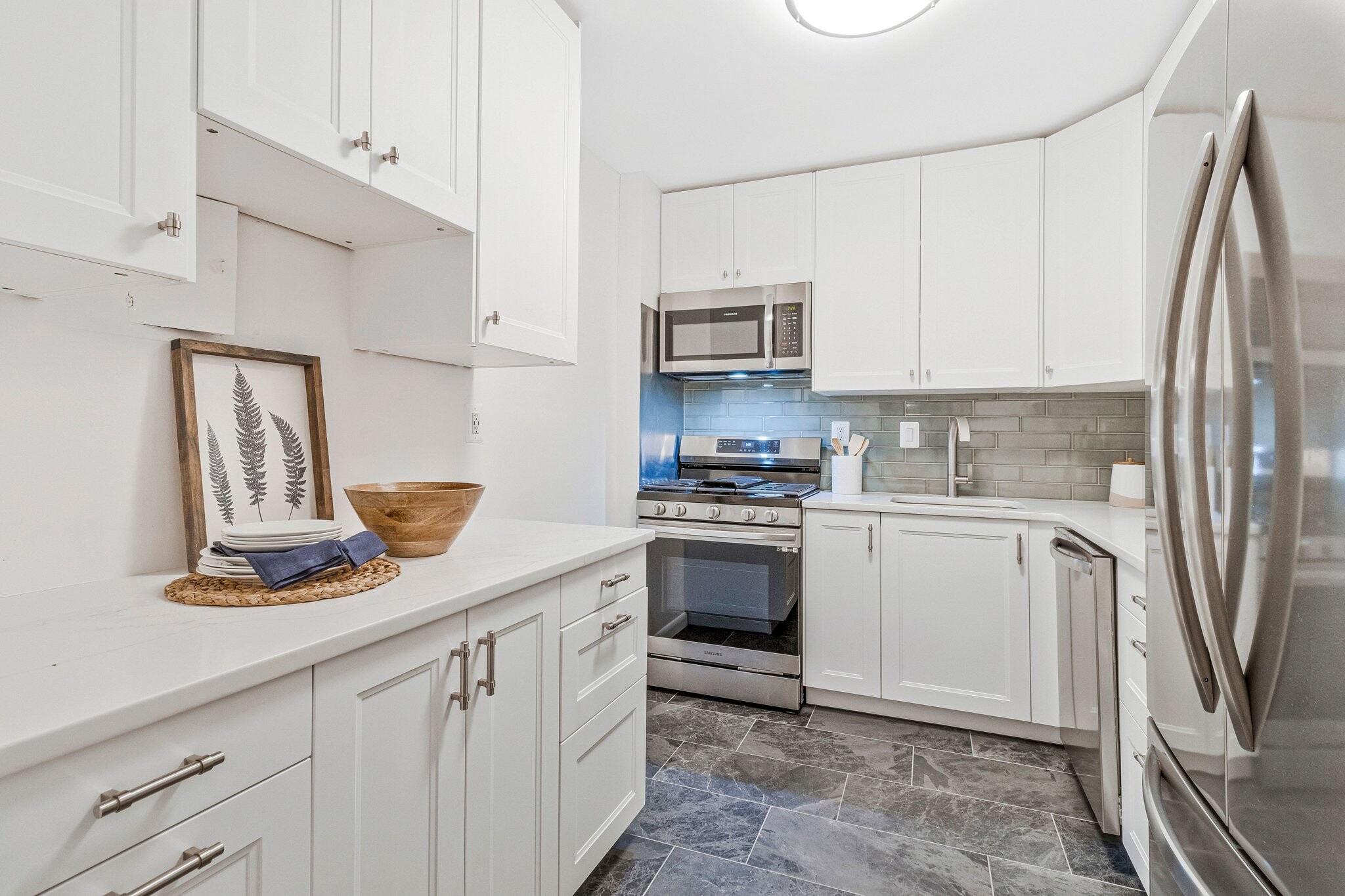 Kitchen with quartz countertops - 2939 Van Ness St NW