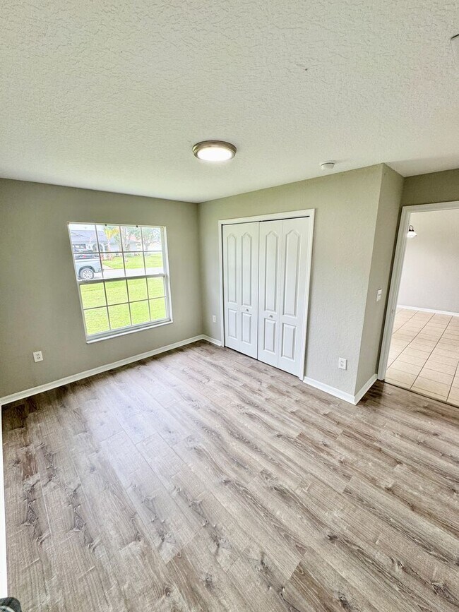 Building Photo - 4 Bedroom 2 Bath Home in Poinciana Village 3