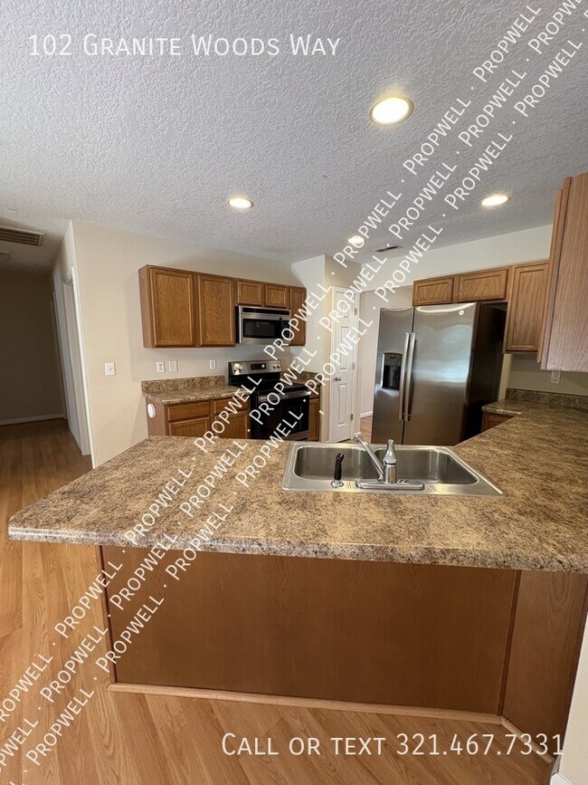 Building Photo - 102 Granite Woods Way