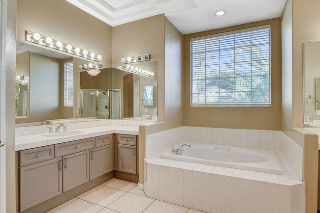 Building Photo - Luxury 5-Bedroom Guard-Gated Home with Pool, Spa & 3 En-Suite Bedrooms