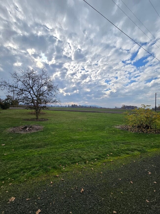 Building Photo - Pet Friendly 3 Bed / 2Bath Home with 2 Garages, Open Air Covered Storage, Large Open Yard, and more!