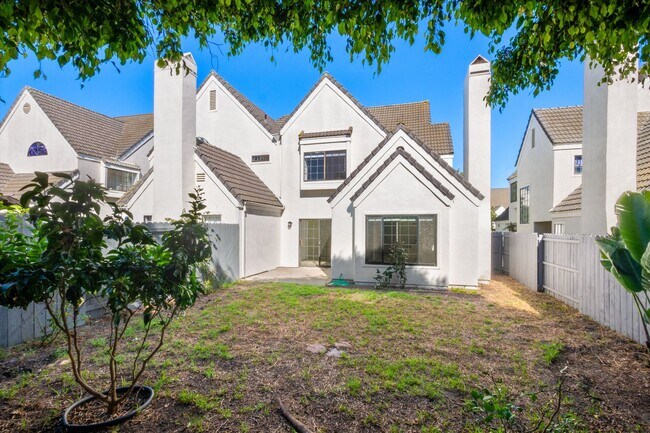 Building Photo - Large Renovated 3bed x 2.5bath Townhouse with Private Patio & 2-Car Garage