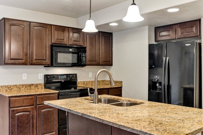 Building Photo - Pet Friendly Townhome w attached 2 car garage