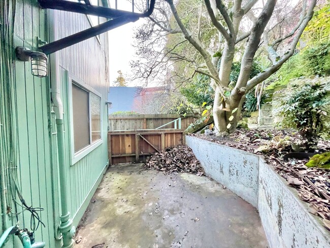 Building Photo - 2BR / 2BA w/ Garage, Outdoor Space, In uni...