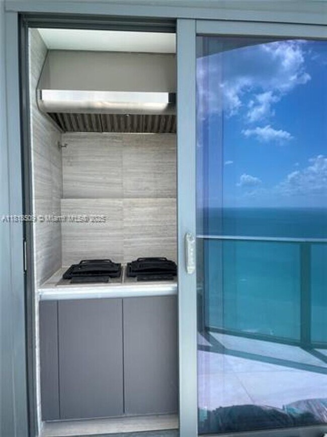 Building Photo - 19575 Collins Ave