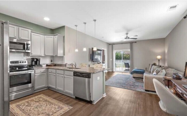 Building Photo - Enjoy Carolina Living: 3BR Home in The Farm w/ Outdoor Living Upgrades