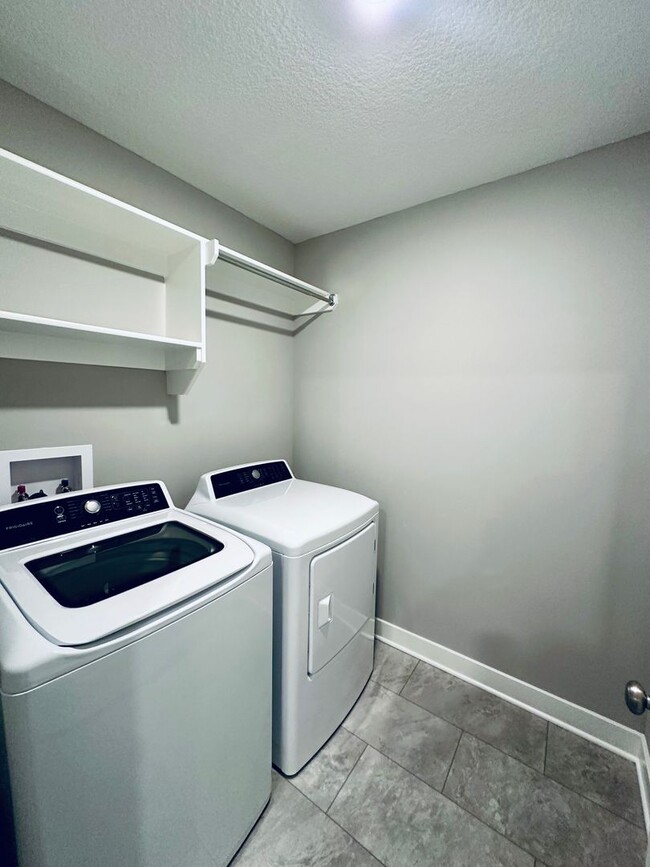 Building Photo - {13305} Less Than 2 Year Old 1.5 Story in ...