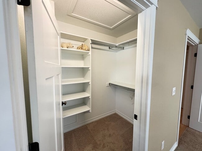 Building Photo - 4 BEDROOM, 3 BATHROOM TWINHOME WITH 2 CAR ATTACHED GARAGE IN NORTH CHEYENNE