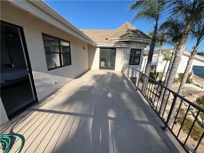 Building Photo - Stunning Lakefront Retreat in Gated Canyon...