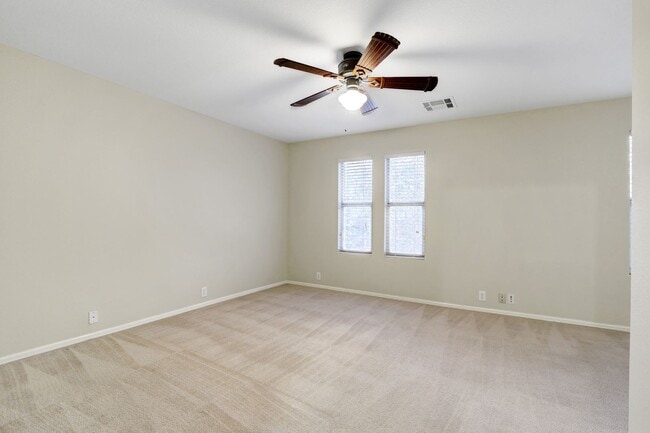 Building Photo - Stylish Two-Story Townhome with Greenbelt ...