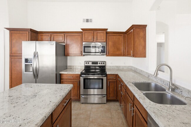 Building Photo - 9321 E Caribbean Ln