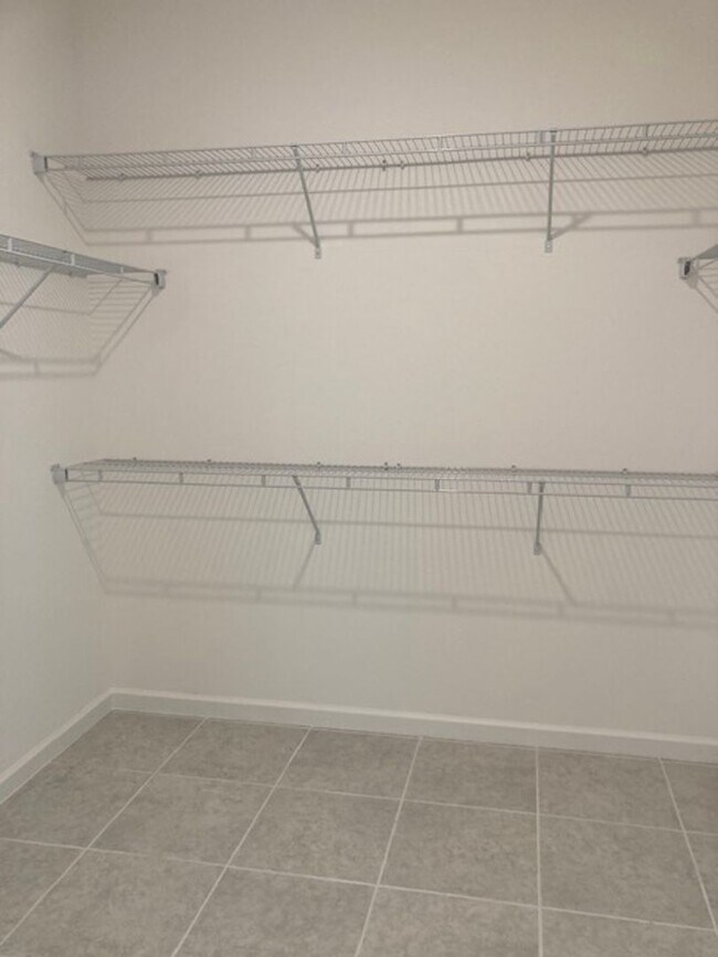 Building Photo - Like New 3 bedroom + den with French doors, screened in porch and Fenced yard and much more...