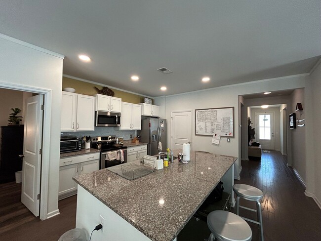 Building Photo - Charming home in Gated Community of Coffee...
