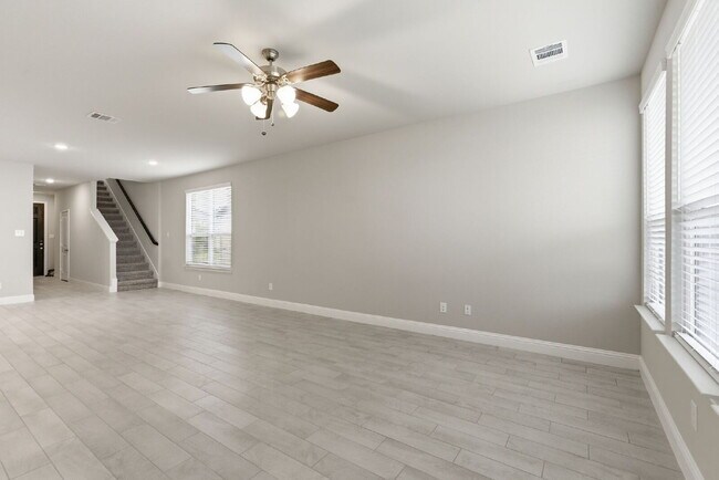 Building Photo - "Open-Concept 4-Bedroom, 2.5-Bath with Designer Finishes and Peaceful Greenbelt Views!"