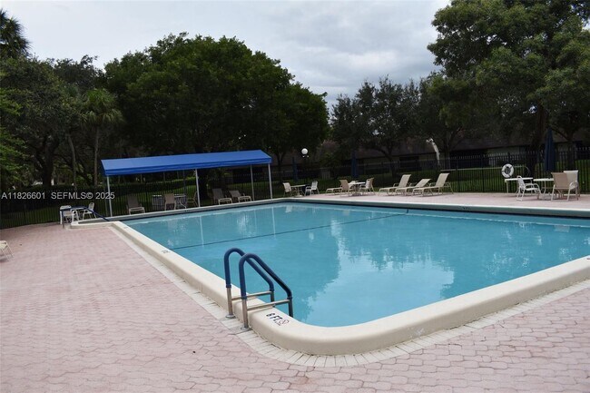 Building Photo - 4459 Carambola Cir S