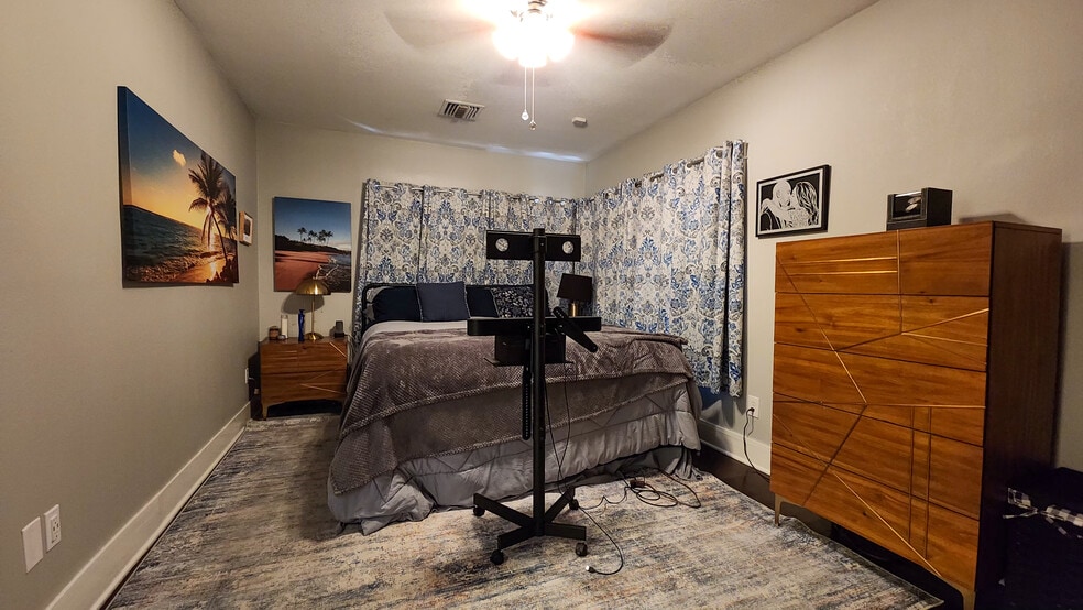 Rear Master bedroom (16'4" x 10'1") UNFURNISHED: This is how a tenant might use the space. - 60 W Lewis Ave