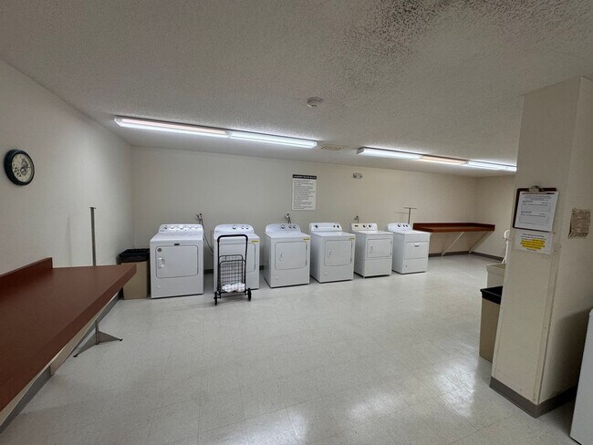 Building Photo - AVAILABLE NOW - Gorgeous 2 BR, 2 BA Condo, with Parking and Excellent Location