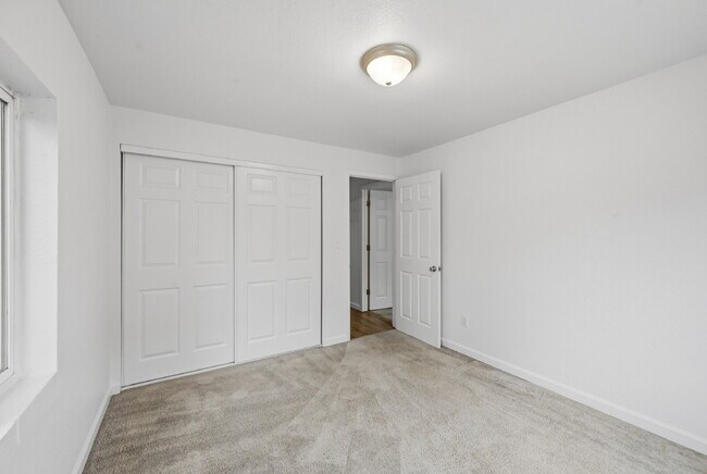 Building Photo - $1,440.95 with $300 Off the first month's rent,  2 Beds - 1 Bath, Condo in Denver with Granite Co...