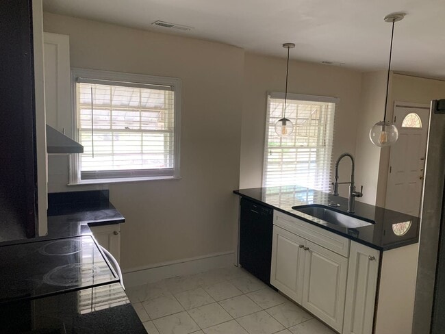 Building Photo - Charming and Modernized Three Bedroom Home...