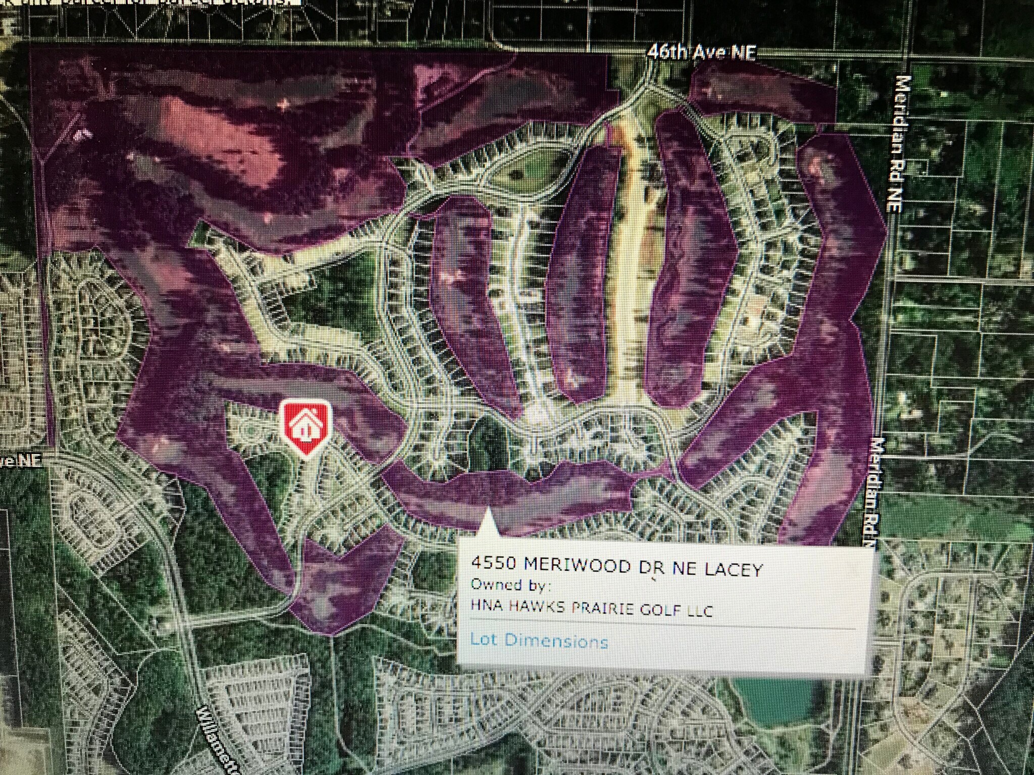 Red indicates home location, Purple two 18 hole golf courses, green residential - 8828 Jayden Ln NE