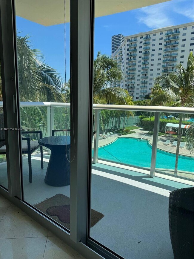 Building Photo - 19380 Collins Ave