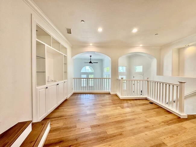 Building Photo - Beautifully Remodel Townhouse with AC & Two Car Garage!
