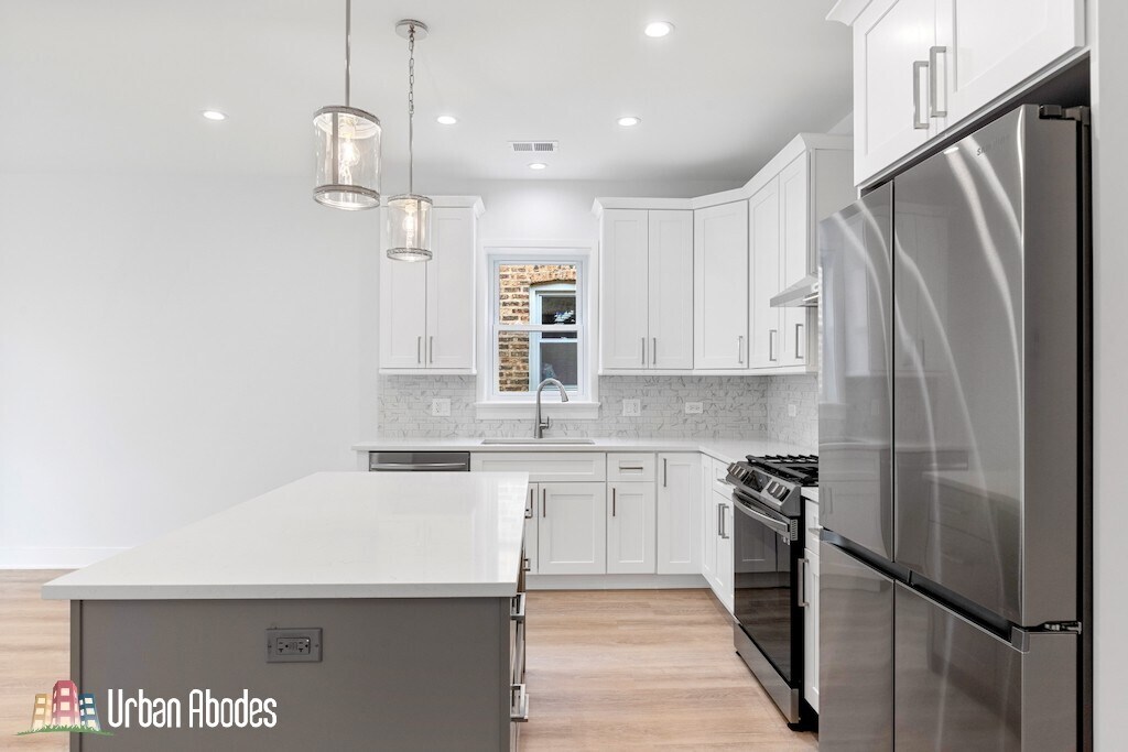 Building Photo - 6423 N Washtenaw Ave