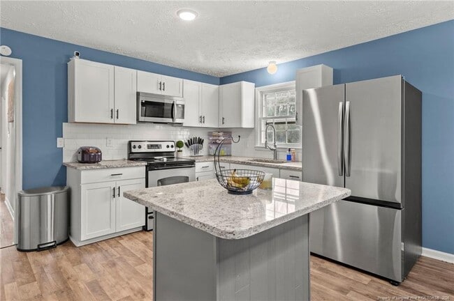 Building Photo - 5861 Columbine Rd