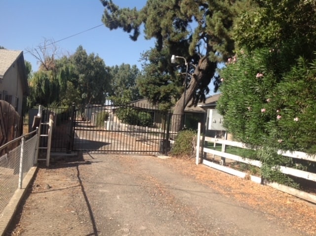 Shared gated entrance - 3339 E Service Rd