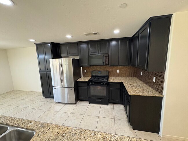 Building Photo - North East Visalia Home coming soon!