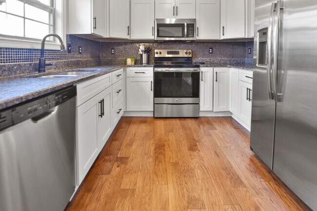 Building Photo - Pet Friendly Four Bedroom with Basement in...