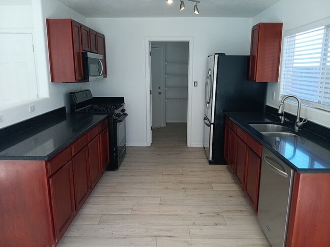 Building Photo - 3 Bedroom, 2.25 Bathroom Home! Ready to see the property in person? Call us at (505) 831-8700 to ...