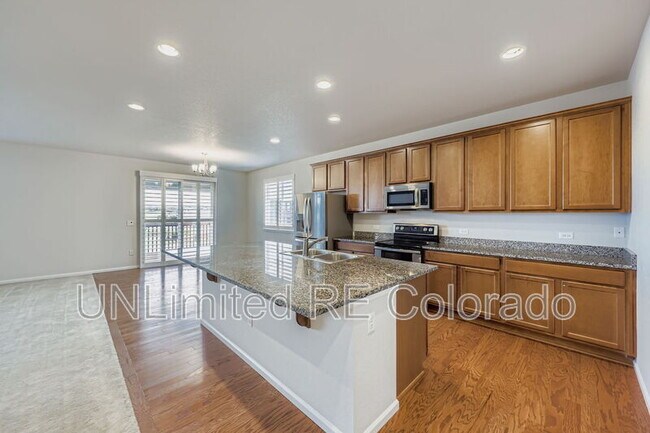 Building Photo - 6782 Petunia Pl